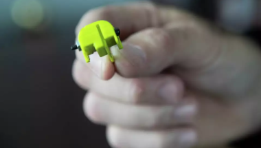 A 3D-printed "Glock switch" is seen in Houston in 2022. The device can convert a semi-automatic firearm into a machine gun. 